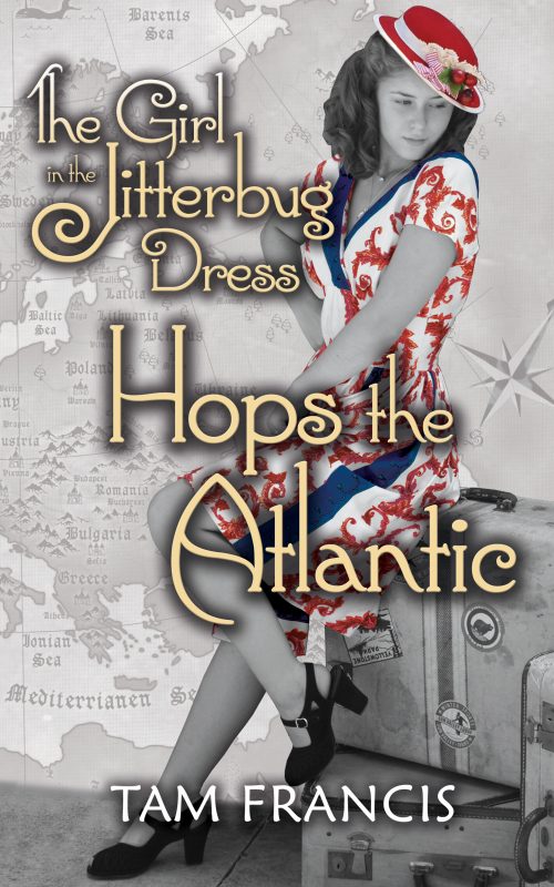 Jitterbud dress girl in red white and blue vintage dress sitting on vintage suitcases with map of the world in the background